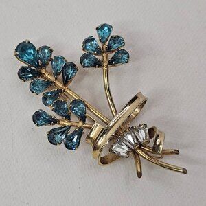 Phyllis Gold Tone Flower Brooch Blue Clear Rhinestone Open Back Bouquet Pin